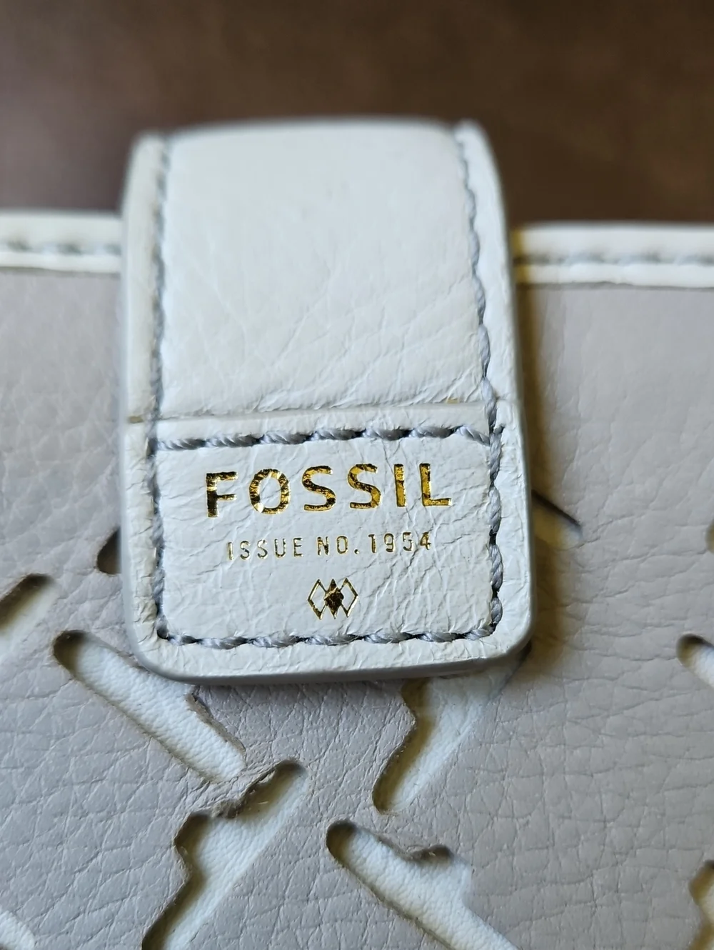 Fossil Emerson SWL1316 Laser-Cut Leather Bifold Wristlet Wallet Cream Taupe